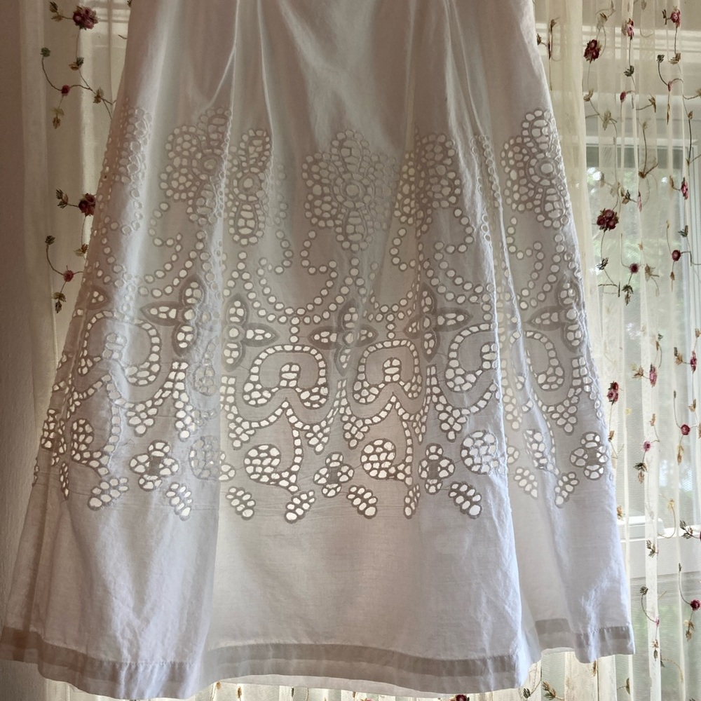 White eyelet skirt fully lined.